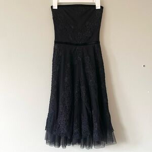 black lace, velvet, and tule strapless dress